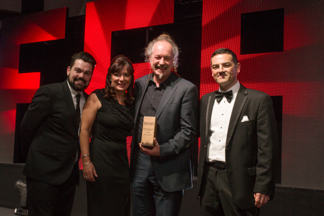 Jane Russen and Pete Holdich pick up the prize