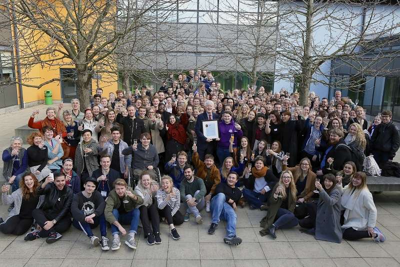 Students, staff, alumni and governors celebrate with Principal Michael Earley and Students’ Union president, Stacey Sandford (photo: Michael O’Reilly)