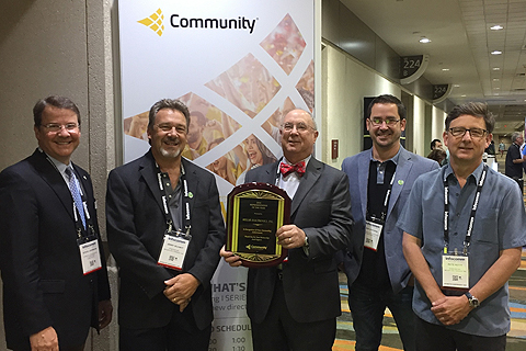 Community CEO Steve Johnson with Millar Electronics’ Jerry Silhavy, Herman Civils, Todd Stevens and Pete Petty