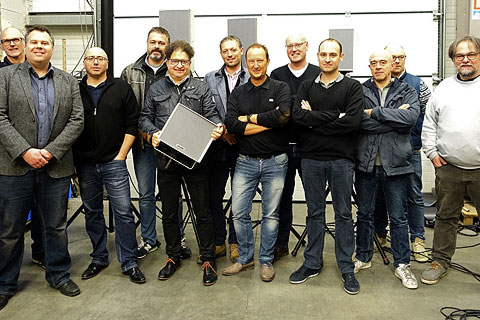 The DV2 team with Community’s EMEA sales manager, Jamie Ward  and Guy Vignet, president of DV2, holding loudspeaker