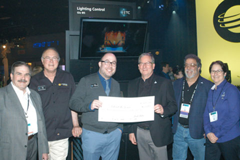 Nick Gonsman, ETC field project coordinator, presents the cheque to Rick Rudolph. Looking on are ETC’s CEO, Fred Foster, and BTS board members Bill Groener, Bill Sapsis and Lori Rubinstein