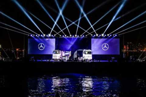 The dramatic reveal of the new models included a stunning off-shore laser show