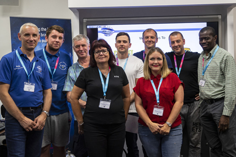 Students pictured with tutors Andy Friedli (far left) and Mandy Bullock-Williams (fourth from left)