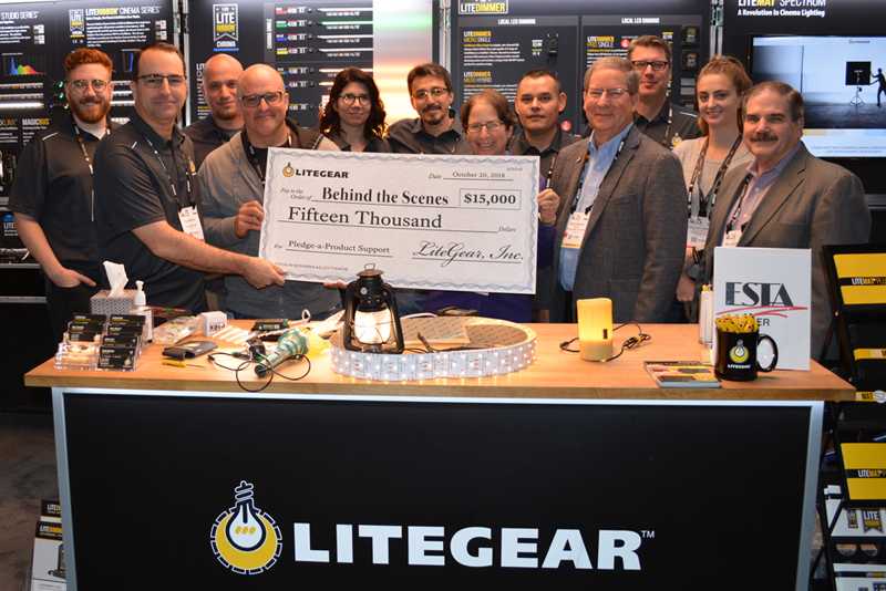 LiteGear owners Al DeMayo and Mike Bauman and their staff present a cheque to Behind the Scenes Board members Bill Groener, Rick Rudolph and Lori Rubinstein