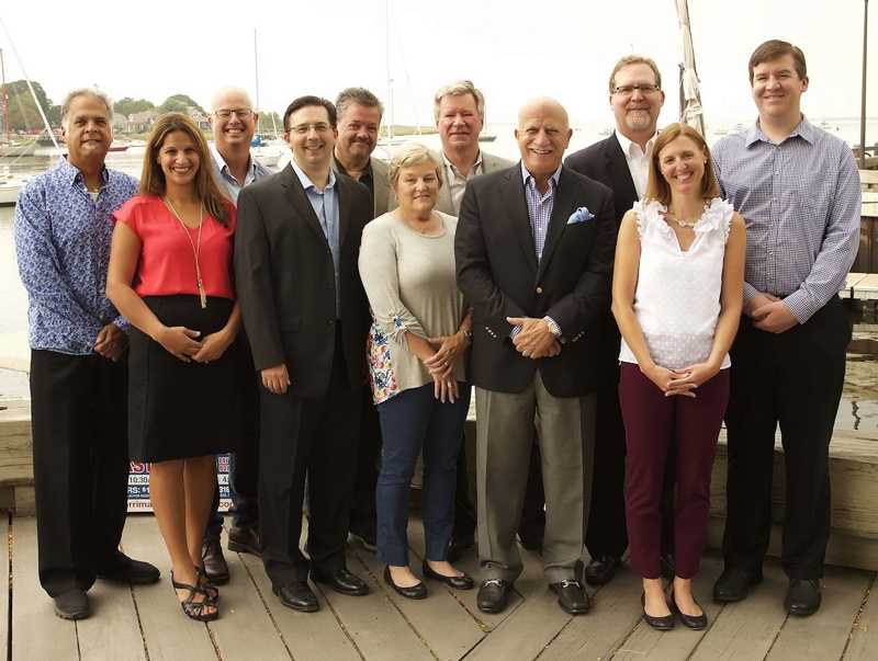 The RDA team: (front) Monica Moufrage, Sean Estella, Suzie Markos, Dick Bazirgan, Amy Lucy; (back) Lew DiTommaso, John Davidson, Fred Renz, Bill King, Dave Dusman and Adam Morrison