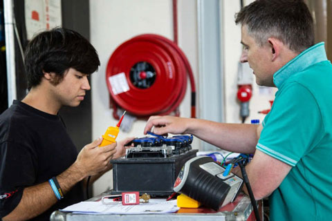 James Eade (right) teaching an electrical safety course © E-Mech Ltd.