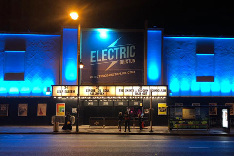 LED fixtures light the building’s front wall