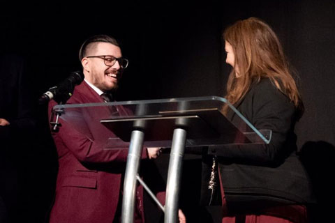 NFTS graduate Michael Pearce receives his award