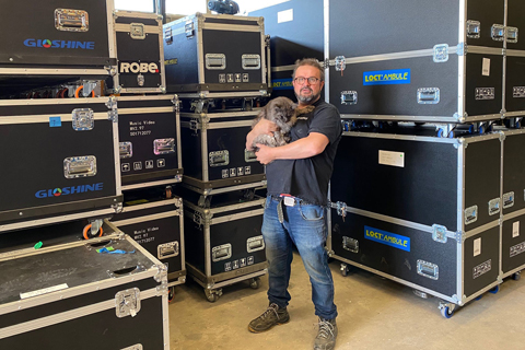 Jacky Fregonese and Carbon the warehouse cat