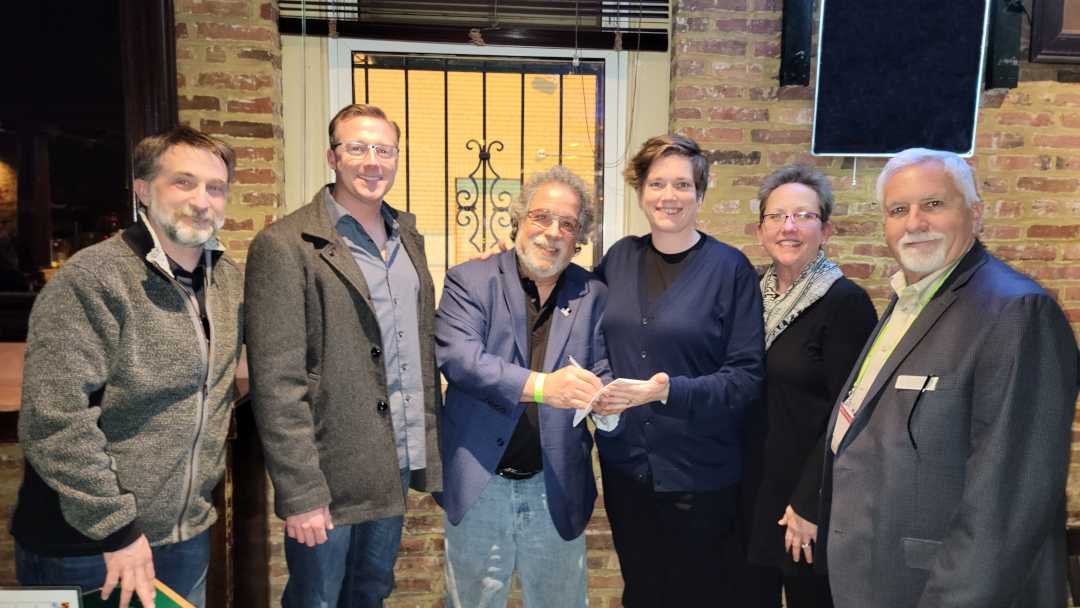 The official signing of the napkin! - Elmer Veith (ESTA secretary), Todd Spencer (ESTA president), Bill Sapsis (NATEAC director emeritus), Erin Grabe, Tracey Cosgrove and Steve Surratt (ESTA executives)